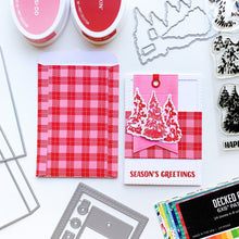 Load image into Gallery viewer, Catherine Pooler - Stamps - Evergreen Woods. Create your own Evergreen Woods with our 6x8 layering stamp set and coordinating Evergreen Woods Dies. This set contains multi-step stamps to "build" a forest of pine trees or an individual tree. The addition of the North Star stamp will bring added warmth to your winter scene or even make a nice holiday tree topper. Available at Embellish Away located in Bowmanville Ontario Canada. Card example made by brand ambassador.