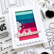 Load image into Gallery viewer, Catherine Pooler - Word Die - Fabulous. Make every paper project fabulous with the Fabulous Word Die. This scripted word die is a sassy, modern font. Use it alone as a fun statement on your card or pair it with the Just Plain Fabulous Sentiments Stamp Set for more sentiment options! The Fabulous Word Die measures approx. 3 1/2" x 1 1/4". Available at Embellish Away located in Bowmanville Ontario Canada. Card by Ambassador.