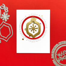 Load image into Gallery viewer, Catherine Pooler - Dies - Round of Merry. Let's have a round of merry, this holiday season with the Round of Merry Dies. This pair of nesting "Merry Christmas" word dies does double duty in creating both a sentiment and shape element for your Christmas cards. One says "Merry Christmas" around the perimeter and the other has a scripted greeting inside. Available at Embellish Away located in Bowmanville Ontario Canada. Card Example by Catherine Pooler.