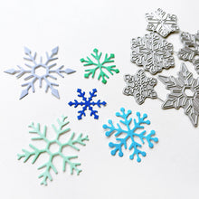 Load image into Gallery viewer, Catherine Pooler - Dies - Snow Many Flakes. You can never have too many snowflakes. So bring on the Snow Many Flakes Dies! This set of 5 graduated size snowflake dies will give you lots of options to layer on the snow! Available at Embellish Away located in Bowmanville Ontario Canada.