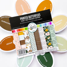Load image into Gallery viewer, Catherine Pooler - Patterned Paper - Painted Butterflies. The Painted Butterflies Pattern Paper has a modern artistic vibe. This pack features butterflies and florals along with a mix of abstract patterns. Available at Embellish Away located in Bowmanville Ontario Canada.