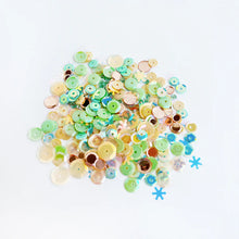 Load image into Gallery viewer, Catherine Pooler - Sequin Mix - Zermatt. Join us in at the top of the world from the Alps in Zermatt, Switzerland! The Zermatt Sequin Mix is a fun snowy mix of iridescent sequins that coordinate with Apricot, Buttercream and Wintergreen Inks. Available at Embellish Away located in Bowmanville Ontario Canada.