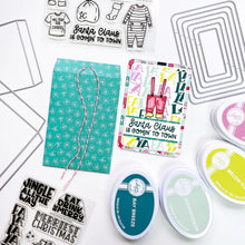 Load image into Gallery viewer, Catherine Pooler - Stamp Set - Old Saint Nick. The Old Saint Nick 6x8 Stamp Set has everything but the man himself! This fun line-art set includes all of Saint Nick's gear from his suit and boots to his long johns to keep him cozy in the North Pole! Available at Embellish Away located in Bowmanville Ontario Canada. Card example by brand ambassador.