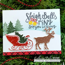 Load image into Gallery viewer, Catherine Pooler - Stamp Set - Sleigh Ride. What could be better then a ride through the snow? With the Sleigh Ride Stamp Set you can ride through the snow in the back of reindeer drawn sleigh and pull your tree from the forest on the back of your pickup truck. Don't forget you thermos of hot cocoa while out in the snow enjoying your day! Available at Embellish Away located in Bowmanville Ontario Canada. Card made by Lisa Harrolle.