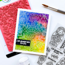 Load image into Gallery viewer, Catherine Pooler - Stamp & Die Set - We Fit. You'll find charming folk art nesting dolls in the We Fit Stamp Set. This line art stamp set has 3 dolls and a cat doll that stamp along side one another from large to small! This set inspired by the art of Eastern Europe includes sweet sentiments like "the world needs you to be you" and "i am always here for you". Available at Embellish Away located in Bowmanville Ontario Canada. Card by brand ambassador.