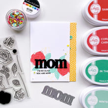 Cargar imagen en el visor de la galería, Catherine Pooler - Word Die - Just Mom. Send a card to your favorite mom! The Just Mom Word Die is a simple block font "mom" that will be a cute addition to any card for mother's day or any day celebrating your best lady! Take the "m" and cut one hump off to create "mum"! The Mom Word Die measures approx. 3" x 1". Illustrated by Lisa Kirkbride. Available at Embellish Away located in Bowmanville Ontario Canada. Card by brand ambassador.