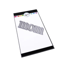 Cargar imagen en el visor de la galería, Catherine Pooler - Word Die - Just Mom. Send a card to your favorite mom! The Just Mom Word Die is a simple block font "mom" that will be a cute addition to any card for mother's day or any day celebrating your best lady! Take the "m" and cut one hump off to create "mum"! The Mom Word Die measures approx. 3" x 1". Illustrated by Lisa Kirkbride. Available at Embellish Away located in Bowmanville Ontario Canada.