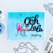 Load image into Gallery viewer, Catherine Pooler - Word Die - Ooh LaLa. Ooh Lala, this word die is divine!! The Ooh Lala is a cute addition to a card celebrating exciting news! It pairs perfectly with our Dreaming of France Stamp Set but will also be a cute focal point for a birthday or a fun way to say congrats. Die measures approx. 2-1/2" x 3". Available at Embellish Away located in Bowmanville Ontario Canada. Card example by Catherine Pooler