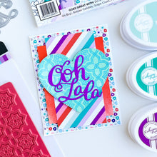 Load image into Gallery viewer, Catherine Pooler - Word Die - Ooh LaLa. Ooh Lala, this word die is divine!! The Ooh Lala is a cute addition to a card celebrating exciting news! It pairs perfectly with our Dreaming of France Stamp Set but will also be a cute focal point for a birthday or a fun way to say congrats. Die measures approx. 2-1/2" x 3". Available at Embellish Away located in Bowmanville Ontario Canada. Card example by Catherine Pooler