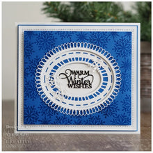 Load image into Gallery viewer, This seven-die set with a beautiful outside edge will be a great addition to your festive paper craft arsenal the die will be wonderful for card making, scrapbooking, mixed media and not just at Christmas. Packet includes card inspiration. Seven die set, largest die size 13.0 x 15.3 cm. Available at Embellish Away located in Bowmanville Ontario Canada. Card Example