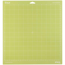Load image into Gallery viewer, Cricut - Cutting Mats 12"X12" - 2/Pkg - StandardGrip. This multi-purpose mat is perfect for a wide range of medium weight materials: patterned paper, vinyl, iron-on and cardstock. This package contains two 12x12 inch standard grip cutting mat. Imported. Available at Embellish Away located in Bowmanville Ontario Canada.