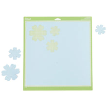 Load image into Gallery viewer, Cricut - Cutting Mats 12"X12" - 2/Pkg - StandardGrip. This multi-purpose mat is perfect for a wide range of medium weight materials: patterned paper, vinyl, iron-on and cardstock. This package contains two 12x12 inch standard grip cutting mat. Imported. Available at Embellish Away located in Bowmanville Ontario Canada.