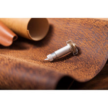 Load image into Gallery viewer, Cricut - Maker Knife Housing & Blade. This durable blade was specially designed to cut thicker, dense materials like balsa wood, chipboard, leather, and craft form for sturdier projects. Create detailed cuts with ease and precision! This 3x5.25 inch package contains one knife blade and drive housing. Available at Embellish Away located in Bowmanville Ontario Canada.