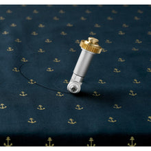 Load image into Gallery viewer, Cricut - Maker Rotary Blade Kit. The replacement rotary blade kit for the Cricut Maker makes it easy to change the blade to ensure the best cutting performance on flexible materials! This 3x5.25x.875 inch package contains one protective cap with rotary blade, washer, nut (preinstalled), small screwdriver and blade changing instructions. Imported. Available at Embellish Away located in Bowmanville Ontario Canada.