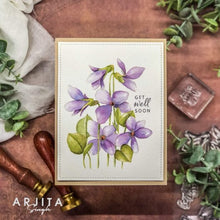 Cargar imagen en el visor de la galería, Gina K. Designs - Stamp & Die Set - Blue Violets. Blue Violet is a stamp set by Arjita Singh. This set is made of premium clear photopolymer and measures 6" X 8". The die set gives you the ability to cut out and layer, creating texture to your creation. Available at Embellish Away located in Bowmanville Ontario Canada. Example by brand ambassador.