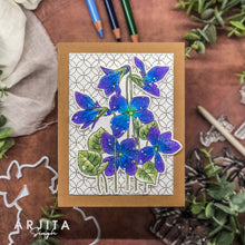 Cargar imagen en el visor de la galería, Gina K. Designs - Stamp & Die Set - Blue Violets. Blue Violet is a stamp set by Arjita Singh. This set is made of premium clear photopolymer and measures 6" X 8". The die set gives you the ability to cut out and layer, creating texture to your creation. Available at Embellish Away located in Bowmanville Ontario Canada. Example by brand ambassador.