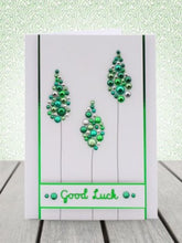 Load image into Gallery viewer, This stunning selection of brand new gemstones from Hunkydory Crafts is the perfect essential addition to your craft stash! The brand new packs include 3 different sizes – 3mm, 5mm and 7mm and include a range of colours. Available at Embellish Away located in Bowmanville Ontario Canada. Example by brand ambassador.