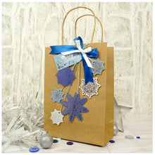Load image into Gallery viewer, Hunkydory Crafts - Die-cuts - Let it Snow Snowflake. 10-sheet pack, 2 x A4 sheets in each of the 5 colourways. Each pack contains 10 x A4 beautifully foiled & die-cut cardstock sheets, featuring a variety of delicate snowflake designs. Each sheet includes 23 different snowflakes, that’s a whopping 230 snowflakes in every pack! Available at Embellish Away located in Bowmanville Ontario Canada. Treat Bag example by Hunkydory Crafts.