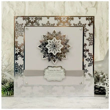 Load image into Gallery viewer, Hunkydory Crafts - Die-cuts - Let it Snow Snowflake. 10-sheet pack, 2 x A4 sheets in each of the 5 colourways. Each pack contains 10 x A4 beautifully foiled & die-cut cardstock sheets, featuring a variety of delicate snowflake designs. Each sheet includes 23 different snowflakes, that’s a whopping 230 snowflakes in every pack! Available at Embellish Away located in Bowmanville Ontario Canada. Example by Hunkydory Crafts.