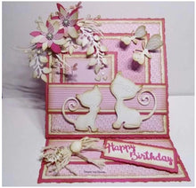 Load image into Gallery viewer, Nellie's Choice - Shape Dies Blue - Strangled Branches with Flowers. This die will cut a circular branch with flowers and berries, and includes 2 additional flower dies to allow you to cut and layer to add dimension to your project. Includes 3 dies. Size: (branch) 4.2 x 3.7 in (flower 1) 1.6 x 1.6 in (flower 2) 1.1 x 1 in. Available at Embellish Away located in Bowmanville Ontairo Canada. Example by designer.