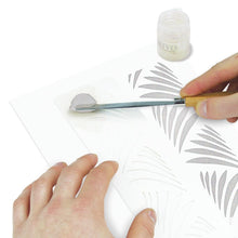 Load image into Gallery viewer, Nuvo - Glimmer Paste - 1.7 oz. Nuvo Glimmer Paste can provide unique variety to your work. Use in combination with any stencil to create dimensional strip designs or bring texture and sparkle to larger areas and projects. The high concentration of glitter is sure to add a vibrant shimmer to whatever you are creating. Available at Embellish Away located in Bowmanville Ontario Canada. Moonstone example