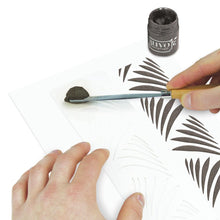 Load image into Gallery viewer, Nuvo - Glimmer Paste - 1.7 oz. Nuvo Glimmer Paste can provide unique variety to your work. Use in combination with any stencil to create dimensional strip designs or bring texture and sparkle to larger areas and projects. The high concentration of glitter is sure to add a vibrant shimmer to whatever you are creating. Available at Embellish Away located in Bowmanville Ontario Canada. Nebulosity Black example.