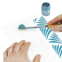Load image into Gallery viewer, Nuvo - Glimmer Paste - 1.7 oz. Nuvo Glimmer Paste can provide unique variety to your work. Use in combination with any stencil to create dimensional strip designs or bring texture and sparkle to larger areas and projects. The high concentration of glitter is sure to add a vibrant shimmer to whatever you are creating. Available at Embellish Away located in Bowmanville Ontario Canada. Turquoise Topaz example.