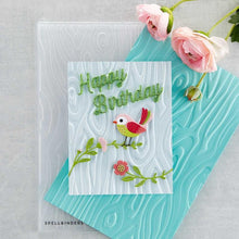 Load image into Gallery viewer, Spellbinders - 3D Embossing Folder - Knock On Wood. This has an intense wood grain designs. Texturize a surface of various card sizes from A2 to a Slimline. For detailed impression, lightly mist the cardstock on both sides with water before embossing. Available at Embellish Away located in Bowmanville Ontario Canada Card example by brand ambassador.