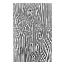 Load image into Gallery viewer, Spellbinders - 3D Embossing Folder - Knock On Wood. This has an intense wood grain designs. Texturize a surface of various card sizes from A2 to a Slimline. For detailed impression, lightly mist the cardstock on both sides with water before embossing. Available at Embellish Away located in Bowmanville Ontario Canada