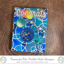 गैलरी व्यूवर में इमेज लोड करें, The Rabbit Hole Designs - Stamp Set - Congrats - Scripty - 3x4. Deeply etched, clear photopolymer stamps for precise placement. The word Congrats is sized so that it may be stamped onto the shadow layer from the coordinating dies (sold separately). Made in USA. Coordinates with Congrats - Scripty Word with Shadow Layer Dies. Available at Embellish Away located in Bowmanville Ontario Canada. Card design by Tanna.