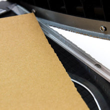 Charger l'image dans la galerie, Tim Holtz - Deckle Cutter 8.5". The Tim Holtz Deckle Torn Edge Trimmer gives your projects the perfect distressed deckle edge effect with maximum control and precision. Designed to provide effortlessly repeatable deckle effects, this new cutting tool from Tim Holtz and Tonic Studios is essential for any crafter looking to bring life to their next design. Available at Embellish Away located in Bowmanville Ontario Canada.