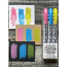 Load image into Gallery viewer, Tim Holtz - Distress Crayon Pearl Set - Holiday Set# 2. Distress Crayons are formulated to achieve vibrant pearlescent coloring effects on porous surfaces for mixed-media. The smooth water-reactive pigments are ideal for creating brilliant backgrounds, water coloring, smudge effects and more! Color directly onto surfaces and blend with water, then layer with Distress Inks or Stains for endless creative possibilities. Available at Embellish Away located in Bowmanville Ontario Canada.