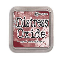 Load image into Gallery viewer, Tim Holtz - Distress Oxide Pad - Large. Create an aged look on papers, fibers, photos and more! This package contains one 2-1/4x2-1/4 inch ink pad. Comes in a variety of distressed colors. Each sold separately. Available at Embellish Away located in Bowmanville Ontario Canada. Aged Mahogany.