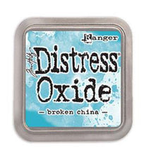 Load image into Gallery viewer, Tim Holtz - Distress Oxide Pad - Large. Create an aged look on papers, fibers, photos and more! This package contains one 2-1/4x2-1/4 inch ink pad. Comes in a variety of distressed colors. Each sold separately. Available at Embellish Away located in Bowmanville Ontario Canada. Broken China