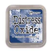 Load image into Gallery viewer, Tim Holtz - Distress Oxide Pad - Large. Create an aged look on papers, fibers, photos and more! This package contains one 2-1/4x2-1/4 inch ink pad. Comes in a variety of distressed colors. Each sold separately. Available at Embellish Away located in Bowmanville Ontario Canada. Chipped Sapphire.
