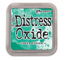 Load image into Gallery viewer, Tim Holtz - Distress Oxide Pad - Large. Create an aged look on papers, fibers, photos and more! This package contains one 2-1/4x2-1/4 inch ink pad. Comes in a variety of distressed colors. Each sold separately. Available at Embellish Away located in Bowmanville Ontario Canada. Lucky Clover