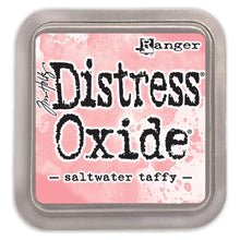 Load image into Gallery viewer, Tim Holtz - Distress Oxide Pad - Large. Create an aged look on papers, fibers, photos and more! This package contains one 2-1/4x2-1/4 inch ink pad. Comes in a variety of distressed colors. Each sold separately. Available at Embellish Away located in Bowmanville Ontario Canada. Saltwater Taffy