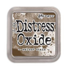 Load image into Gallery viewer, Tim Holtz - Distress Oxide Pad - Large. Create an aged look on papers, fibers, photos and more! This package contains one 2-1/4x2-1/4 inch ink pad. Comes in a variety of distressed colors. Each sold separately. Available at Embellish Away located in Bowmanville Ontario Canada. Walnut Stain