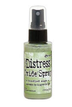 Load image into Gallery viewer, Tim Holtz - Distress Oxide Spray. Creates oxidized effects when sprayed with water. Use for quick and easy ink coverage on porous surfaces. Spray through stencils, layer colors, spritz with water and watch the color mix and blend. Available at Embellish Away located in Bowmanville Ontario Canada. Bundled Sage