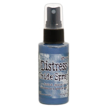 Load image into Gallery viewer, Tim Holtz - Distress Oxide Spray. Creates oxidized effects when sprayed with water. Use for quick and easy ink coverage on porous surfaces. Spray through stencils, layer colors, spritz with water and watch the color mix and blend. Available at Embellish Away located in Bowmanville Ontario Canada. Faded Jeans