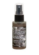 Load image into Gallery viewer, Tim Holtz - Distress Oxide Spray. Creates oxidized effects when sprayed with water. Use for quick and easy ink coverage on porous surfaces. Spray through stencils, layer colors, spritz with water and watch the color mix and blend. Available at Embellish Away located in Bowmanville Ontario Canada. Ground Espresso