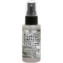 Load image into Gallery viewer, Tim Holtz - Distress Oxide Spray. Creates oxidized effects when sprayed with water. Use for quick and easy ink coverage on porous surfaces. Spray through stencils, layer colors, spritz with water and watch the color mix and blend. Available at Embellish Away located in Bowmanville Ontario Canada. Hickory Smoke