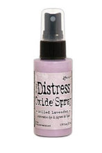 Load image into Gallery viewer, Tim Holtz - Distress Oxide Spray. Creates oxidized effects when sprayed with water. Use for quick and easy ink coverage on porous surfaces. Spray through stencils, layer colors, spritz with water and watch the color mix and blend. Available at Embellish Away located in Bowmanville Ontario Canada. Milled Lavender.