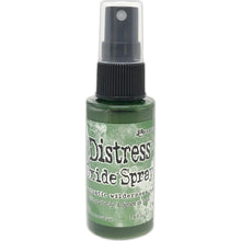 Load image into Gallery viewer, Tim Holtz - Distress Oxide Spray. Creates oxidized effects when sprayed with water. Use for quick and easy ink coverage on porous surfaces. Spray through stencils, layer colors, spritz with water and watch the color mix and blend. Available at Embellish Away located in Bowmanville Ontario Canada. Rustic Wilderness