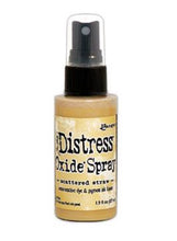Load image into Gallery viewer, Tim Holtz - Distress Oxide Spray. Creates oxidized effects when sprayed with water. Use for quick and easy ink coverage on porous surfaces. Spray through stencils, layer colors, spritz with water and watch the color mix and blend. Available at Embellish Away located in Bowmanville Ontario Canada. Scattered Straw