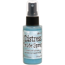 Load image into Gallery viewer, Tim Holtz - Distress Oxide Spray. Creates oxidized effects when sprayed with water. Use for quick and easy ink coverage on porous surfaces. Spray through stencils, layer colors, spritz with water and watch the color mix and blend. Available at Embellish Away located in Bowmanville Ontario Canada. Tumbled lass