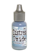 Load image into Gallery viewer, Tim Holtz-Ranger Distress Oxides Reinkers. This water-reactive dye and pigment ink fusion creates an oxidized effect when sprayed with water. Use to re-ink Distress Oxide Ink Pads (sold separately). Available at Embellish Away located in Bowmanville Ontario Canada. Stormy Sky