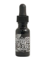 Load image into Gallery viewer, Tim Holtz - Distress Reinker. Create an aged look on papers, fibers, photos and more! This package contains one 0.5oz bottle of distress ink. Acid free. Conforms to ASTM D4236. Comes in a variety of colors. Each sold separately. Available at Embellish Away located in Bowmanville Ontario. Black Soot