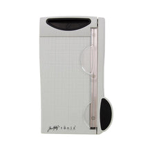 Load image into Gallery viewer, Tim Holtz - Guillotine Mini Trimmer 6.25". The Tim Holtz 6.25 inch / 16cm Mini Trimmer has many features not found in similar products. This product is portable and lightweight. It is perfect for trimming photographs and creating card fronts. Available at Embellish Away located in Bowmanville Ontario Canada.