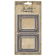 Load image into Gallery viewer, Tim Holtz - Idea-Ology - Metal Photo Frames - 4/Pkg. Add a touch of elegance to your creations with these Frames. These frames are crafted from brushed silver metal, providing a sleek and sophisticated look that is sure to elevate your projects. Available at Embellish Away located in Bowmanville Ontario Canada.